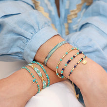 Load image into Gallery viewer, Iztac blue ombré gold woven bracelet
