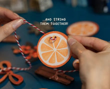 Load image into Gallery viewer, Spiced orange wooden garland