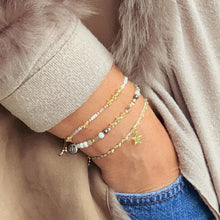 Load image into Gallery viewer, Porrima pearl & gold star charm stretch bracelet