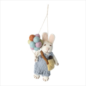 White bunny boy with blue trousers & balloons