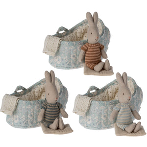 Rabbits in carry cots