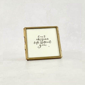 Mini pictures in brass frames