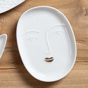 Face shaped trinket dish - gold