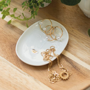 Face shaped trinket dish - gold