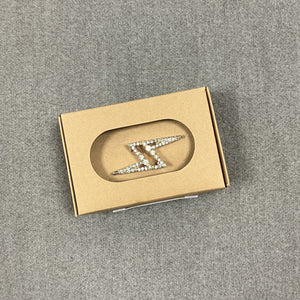 Bejewelled lightning bolt pin