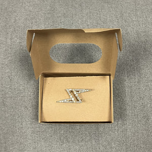 Bejewelled lightning bolt pin