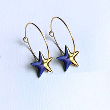 Load image into Gallery viewer, Hoop earrings with pink star charms - gold
