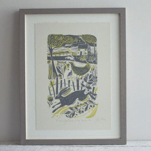 Running hare in the countryside framed print