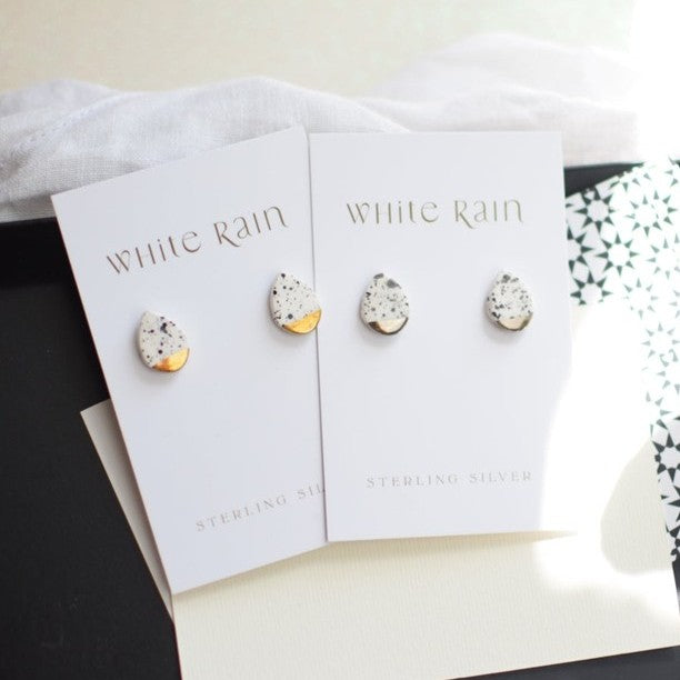 White spotty teardrop shape ceramic studs