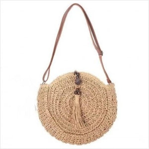 Round straw crossbody bag with tassels - small