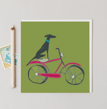 Willow rides her bike greetings card