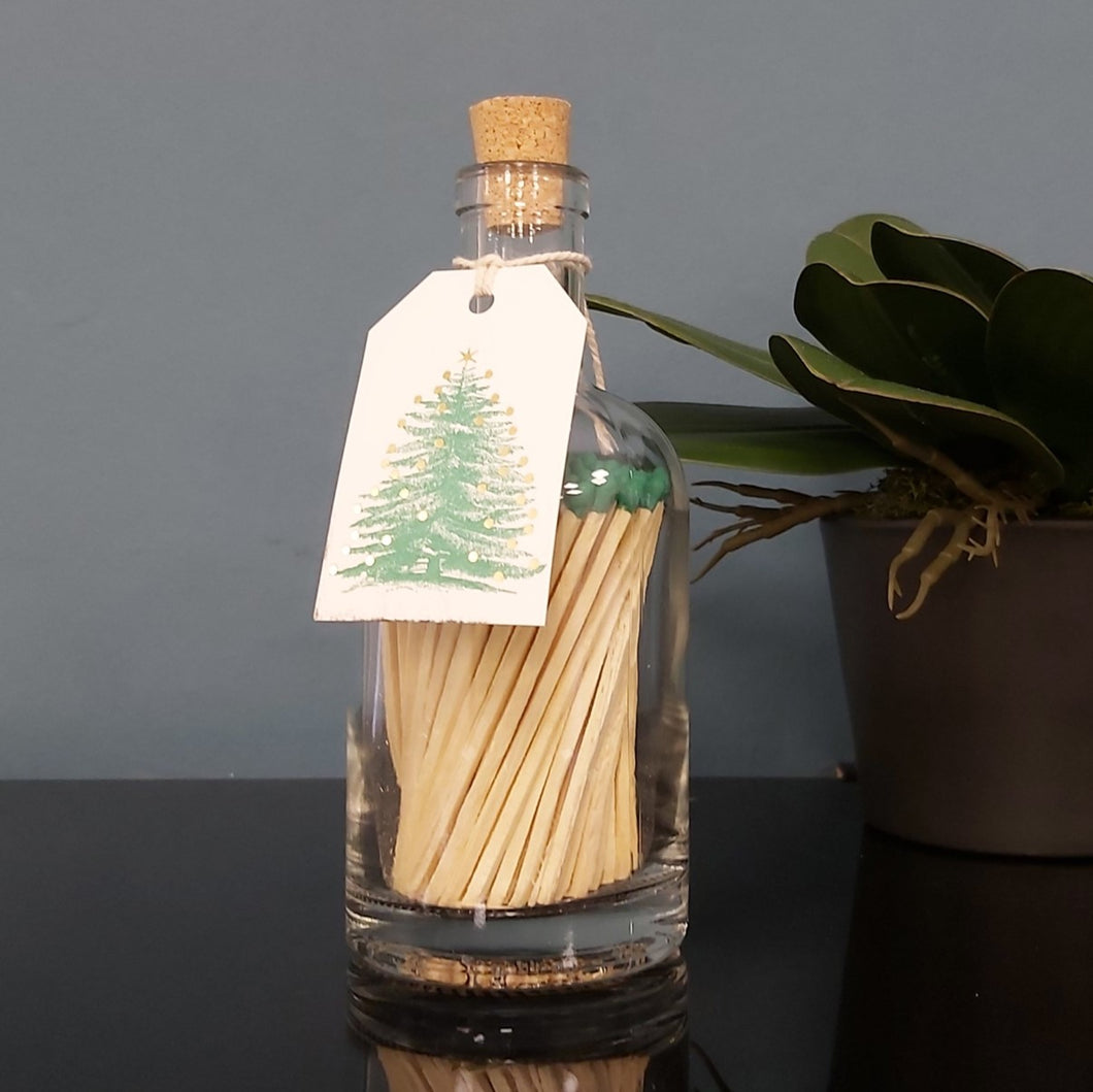 Christmas tree gold baubles match bottle