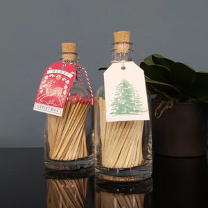 Christmas tree gold baubles match bottle