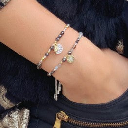 Castor gemstone & gold charm bracelet