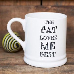 The cat loves me best mug