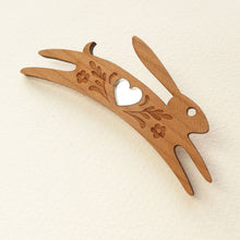 Load image into Gallery viewer, Cherry wood veneer hare with silver heart brooch
