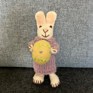 White bunny with ochre trousers