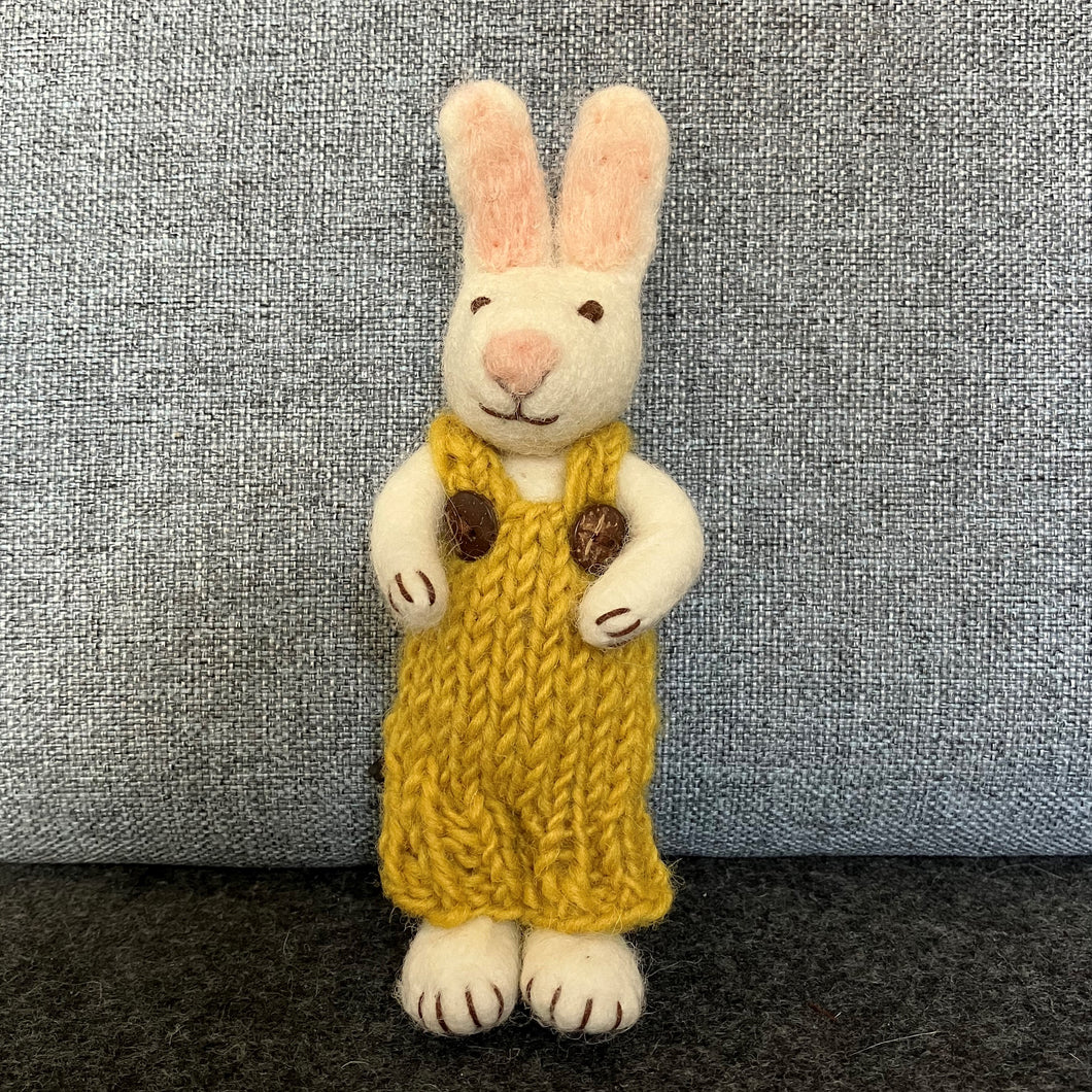 White bunny with ochre trousers