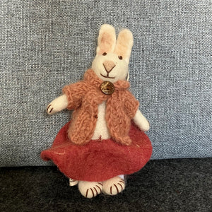 White bunny with ochre trousers