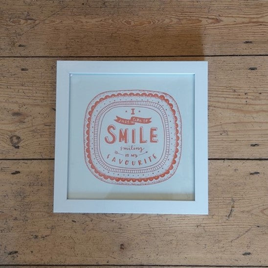 I like to smile (red) framed print