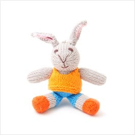 Rabbit toddler toy in orange jumper