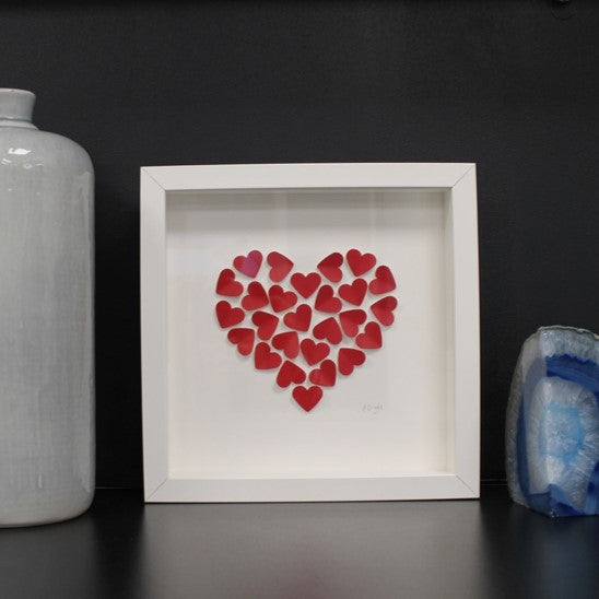 Handmade small white frame medium red hearts in heart shape