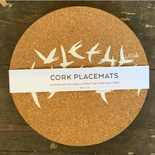 In a lovely white swallow design, delicate and beautiful for any table.  Cork is sustainable, renewable and recyclable - practical too, water impermeable and easily wipe clean and insulating.