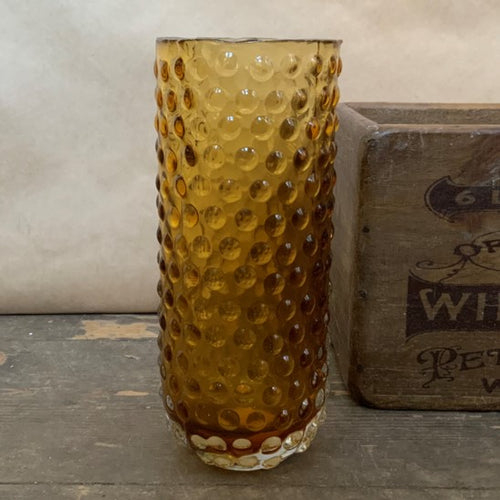 A beautiful brown glass vase which would make a lovely, original gift.
