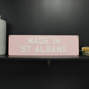 Made in St Albans (21 x 6) sign - pink white text