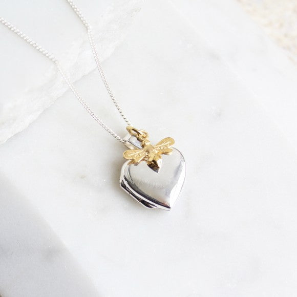 Silver heart locket with gold bee charm