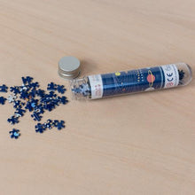 Load image into Gallery viewer, Space age 150 piece mini puzzle in a tube
