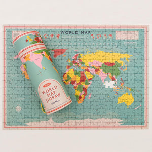 World map puzzle in a tube